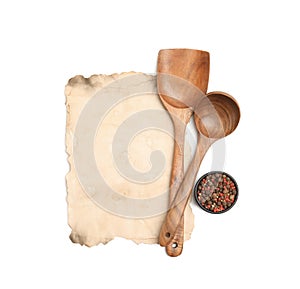 Old cookbook page, spices and wooden utensils on white background, top view. Space for text