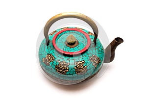 Old copper kettle with natural turquoise
