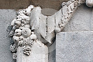 Old cornucopia bas-relief decoration on wall of a building