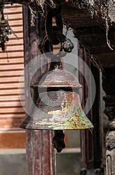 Old corroded bell on a street in Bhaktapur