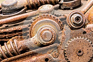 Old corroded mechanical gear cogwheels and sprockets