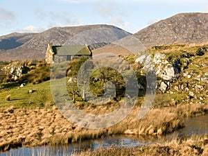 Old cottage at a creek in Ireland