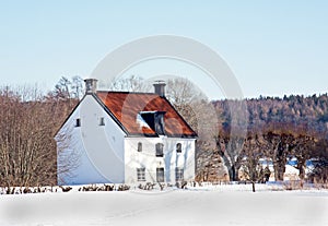 Old cottage in Sweden at wintertime.