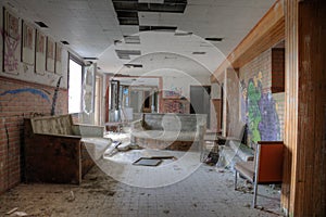 Old couch and red chair