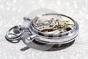 An old countdown timer opened up showing all the details of the mechanism, macro closeup