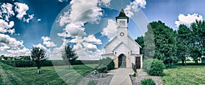 Old country church with cornfields