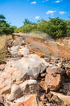 Old countryside road with eroded soil and rocks in the countryside of Oeiras, Piaui