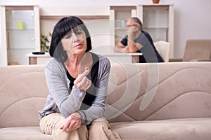 Old couple having argument at home