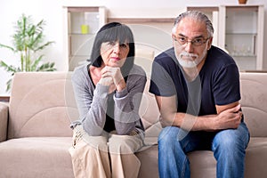 Old couple having argument at home