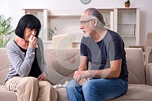 Old couple having argument at home