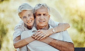 Old couple hug in park, love and marriage portrait, retirement together with commitment and outdoor. Mature man, elderly