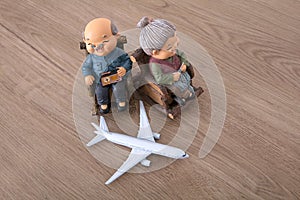 Old couple model and an airplane model