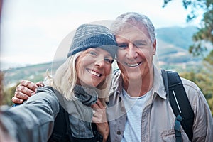 Old couple, selfie and portrait, hiking in forest and happy people in nature and memory for social media post. Smile in