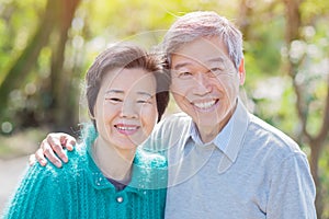 Old couple smile happily