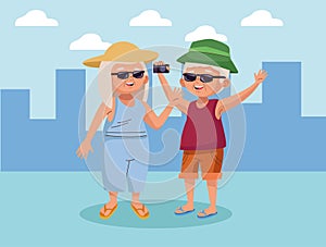 Old couple tourist with camera photographic on the city active seniors