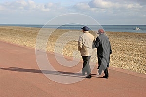 Old couple walking together