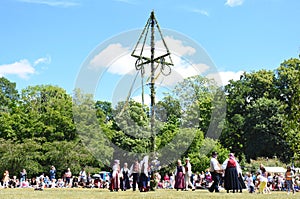 Dance around Midsummer Tree In Sweden