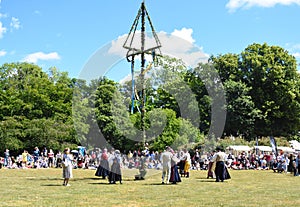 Dance around Midsummer Tree In Sweden