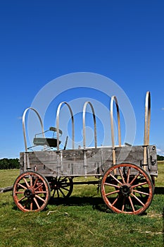 Old covered wagon missing the canvas