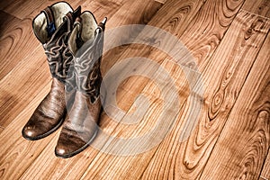 Old Cowboy Boots on Wood Floor