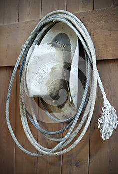 An Old Cowboy Hat and Rope Lariat photo