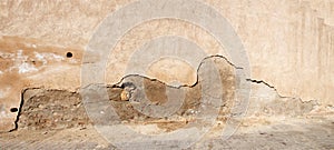 Old, Cracked Adobe Wall Background
