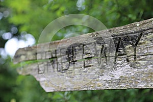 Old Cracked Bridleway Signpost Closeup