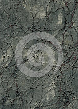 Old cracked canvas with grunge and threads showing