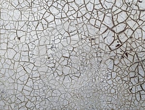 Old cracked paint on the wall. Grunge texture