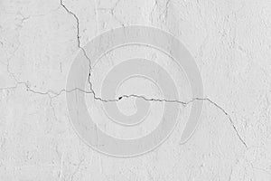Old cracked surface white crack concrete broken wall cement damaged background