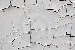 Old cracked white wall