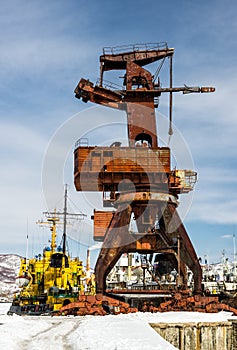 Old crane on seaport photo