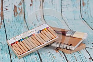 Old Crayon in box on book note