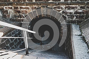 Old creepy underground stone tunnel. Halloween Locations