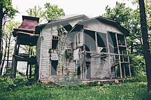 Old creepy wooden abandoned haunted mansion