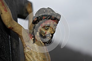 Old crucifix polychrome wood. photo