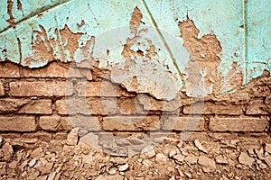 Old Crumbling Red Brick Wall and Green Paint