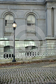 Old Customs House in Portland, Maine, side view with cobblestone street