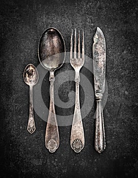 Old cutlery with a patina photo
