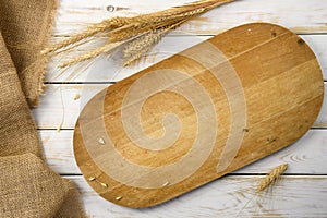 Old cutting board with a grain cereals