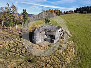 Old czechoslovak concrete fort in meadows in the Rychlebske hory. Czechia