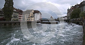 Old dam Nadelwehr in the center of the old town of Lucerne on the Reuss river, Switzerland