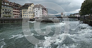 Old dam Nadelwehr in the center of the old town of Lucerne on the Reuss river, Switzerland