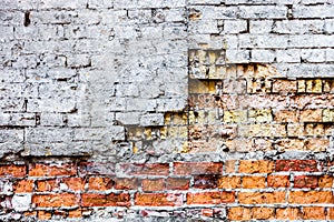 The old damaged brick wall with rich texture