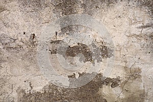 Old damaged brown concrete wall texture. Dirty gray cement background