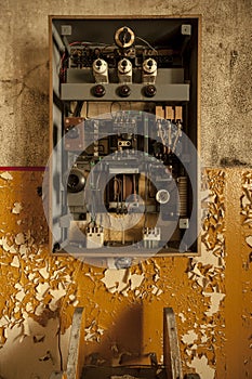 Old damaged electrical cabinet in abandoned factory