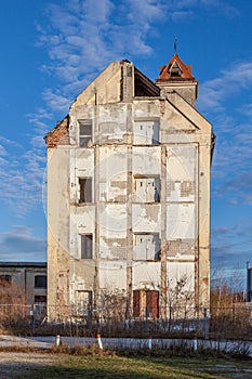 old damaged former industrial site in Allach, Munich with remains of rooms recognizable at the wall