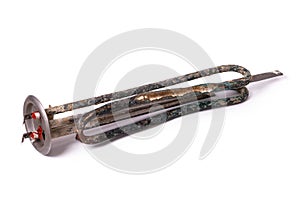 Old damaged heating element for boiler isolated on a white background