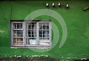 Old damaged windows, grunge window, green wall texture