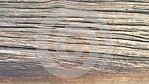 Old dark log. Background of cracked logs.